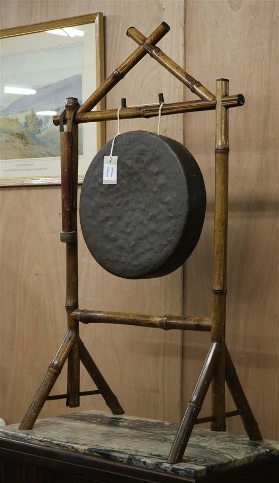 A bronze circular gong on bamboo stand H.104cm